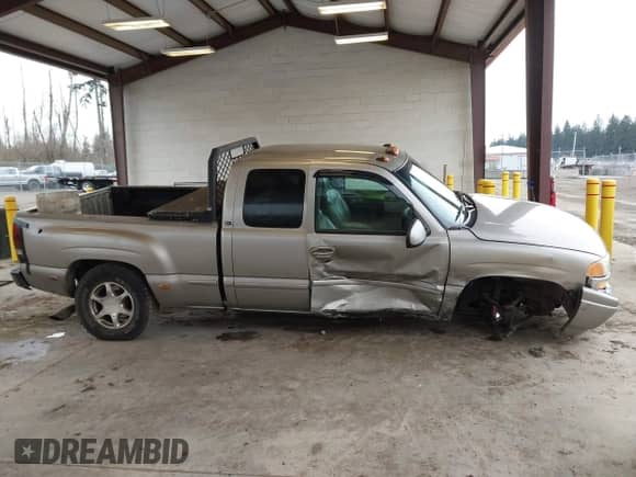 2002 GMC Sierra 1500 Denali z VIN 2GTFK69U421321155, wystawiony jako IAAI lot #41636514 z przebiegiem 171 955 mil mil oraz . Historia ofert i sprzedaży dostępna na DreamBid. Obrazek 13.