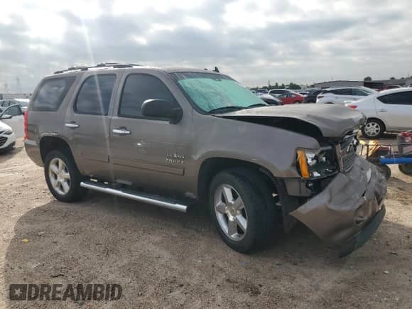 2013 Chevrolet Tahoe LS z VIN 1GNSCAE03DR220272, wystawiony jako Copart lot #89700175 z przebiegiem 144 900 mil mil oraz Szkoda całkowita • Salvage title. Historia ofert i sprzedaży dostępna na DreamBid. Obrazek 4.