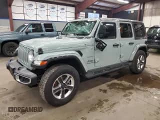2023 Jeep Wrangler Sahara с VIN 1C4HJXEG6PW567528, выставлен на аукционе Copart как лот 88547755 с пробегом 10 944 миль миль и Списание • Salvage title. История ставок и продаж доступна на DreamBid. Изображение 1.