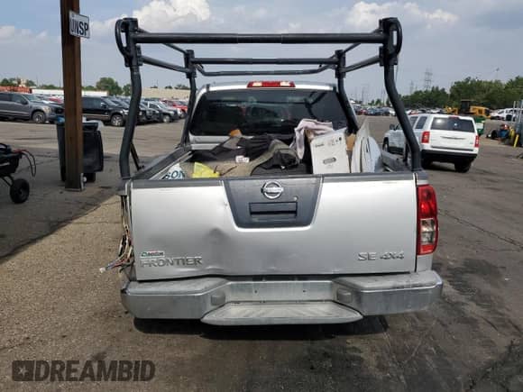 2006 Nissan Frontier SE z VIN 1N6AD07W36C452497, wystawiony jako Copart lot #65447745 z przebiegiem 223 745 mil mil oraz Szkoda całkowita • Salvage title. Historia ofert i sprzedaży dostępna na DreamBid. Obrazek 6.