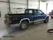 2003 Dodge Dakota SLT z VIN 1D7HG42N13S111122, wystawiony jako Copart lot #65447505 z przebiegiem 89 870 mil mil oraz Szkoda całkowita • Salvage title. Historia ofert i sprzedaży dostępna na DreamBid. Obrazek 3.