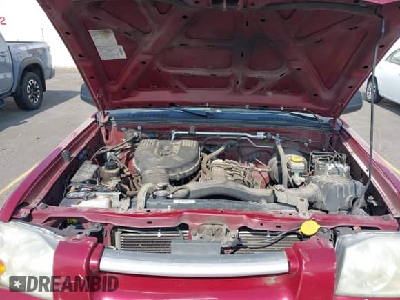 2004 Nissan Frontier XE with VIN 1N6DD26T44C418808, listed as a IAAI auction lot 43220433 with 154,876 mi miles and . Bid and sale history available at DreamBid. Image 10.