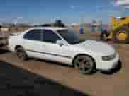 1995 Honda Accord LX z VIN 1HGCD5635SA055901, wystawiony jako Copart lot #58988965 z przebiegiem 253 309 mil mil oraz Szkoda całkowita • Salvage title. Historia ofert i sprzedaży dostępna na DreamBid. Obrazek 4.