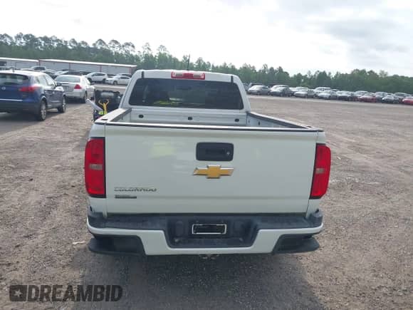 2018 Chevrolet Colorado 4WD Work Truck с VIN 1GCHTBEA1J1155675, выставлен на аукционе IAAI как лот 42138501 с пробегом 93 592 миль миль и . История ставок и продаж доступна на DreamBid. Изображение 16.