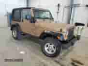 1999 Jeep Wrangler Sport with VIN 1J4FY19S6XP430964, listed as a Copart auction lot 85937775 with 109,444 mi miles and Clean title. Bid and sale history available at DreamBid. Image 4.