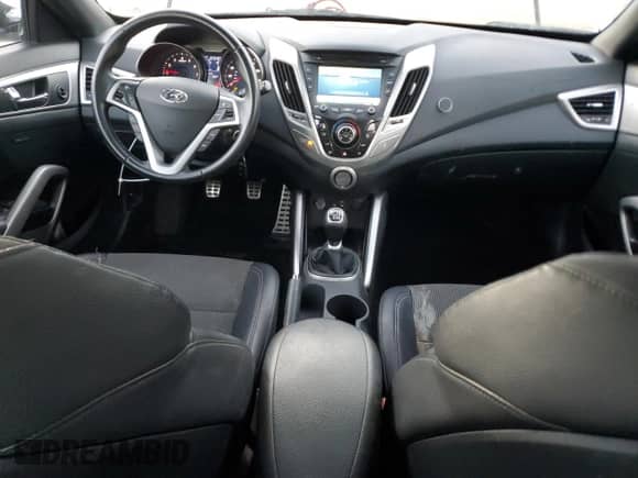 2016 Hyundai Veloster с VIN KMHTC6AD0GU298346, выставлен на аукционе Copart как лот 81289574 с пробегом 87 540 миль миль и Списание • Salvage title. История ставок и продаж доступна на DreamBid. Изображение 8.