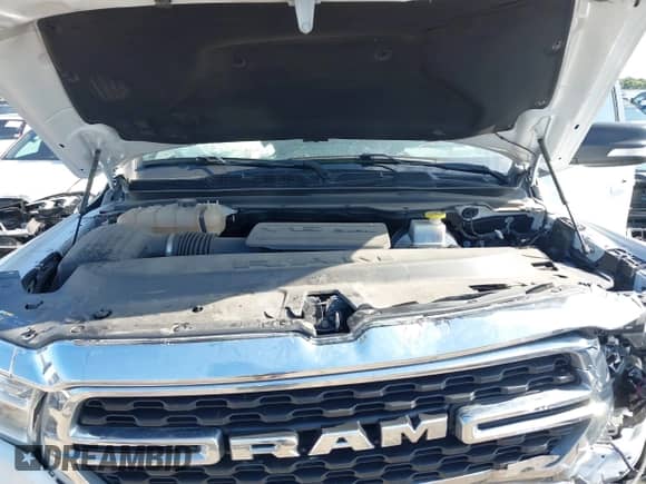 2022 Ram 1500 Big Horn z VIN 1C6RREFG9NN446003, wystawiony jako IAAI lot #42599070 z przebiegiem 61 974 mil mil oraz . Historia ofert i sprzedaży dostępna na DreamBid. Obrazek 10.