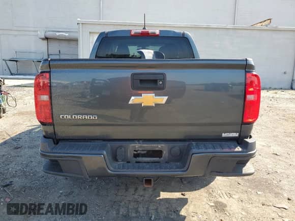 2015 Chevrolet Colorado 4WD Z71 with VIN 1GCGTCE31F1266401, listed as a Copart auction lot 63842585 with 132,703 mi miles and Salvage title. Bid and sale history available at DreamBid. Image 6.