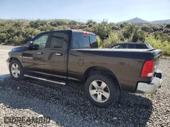 2011 Ram 1500 Big Horn с VIN 1D7RV1GT5BS666587, выставлен на аукционе Copart как лот 66126325 с пробегом 189 527 миль миль и Списание • Salvage title. История ставок и продаж доступна на DreamBid. Изображение 2.