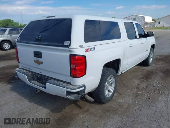 2016 Chevrolet Silverado 1500 LT with VIN 3GCUKRECXGG291194, listed as a IAAI auction lot 42397738 with 185,764 mi miles and . Bid and sale history available at DreamBid. Image 4.