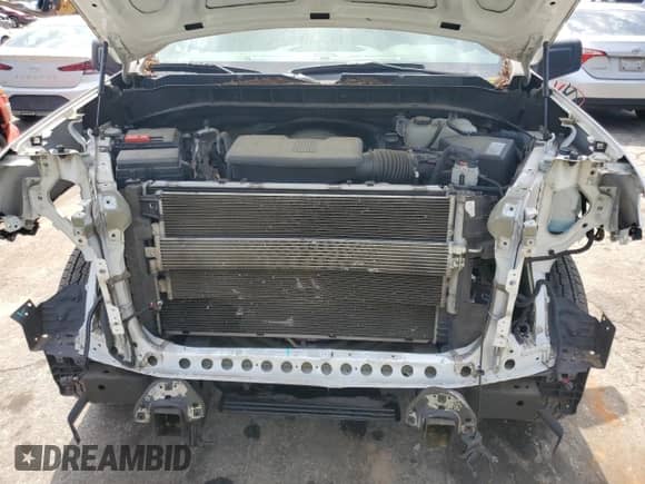 2020 Chevrolet Silverado 1500 Work Truck z VIN 1GCRWAEF7LZ343719, wystawiony jako Copart lot #58968395 z przebiegiem 122 411 mil mil oraz Szkoda całkowita • Salvage title. Historia ofert i sprzedaży dostępna na DreamBid. Obrazek 11.