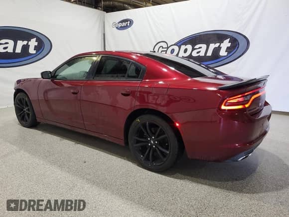 2018 Dodge Charger SXT z VIN 2C3CDXBG5JH187287, wystawiony jako Copart lot #84440765 z przebiegiem 60 703 mil mil oraz Czysty tytuł • Clean title. Historia ofert i sprzedaży dostępna na DreamBid. Obrazek 2.