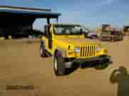 2004 Jeep Wrangler X with VIN 1J4FA39S54P746125, listed as a Copart auction lot 82713424 with 173,856 mi miles and Salvage title. Bid and sale history available at DreamBid. Image 11.