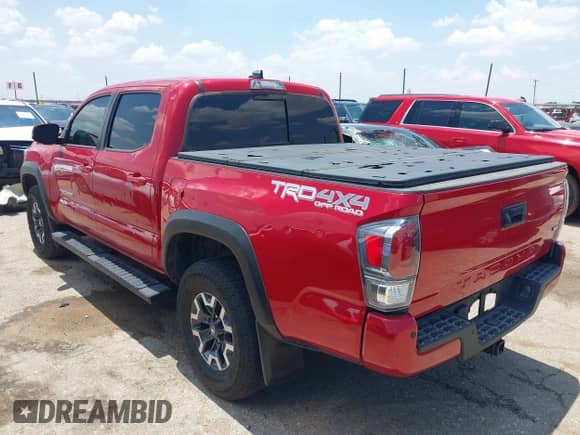 2023 Toyota Tacoma SR z VIN 3TMCZ5AN0PM560313, wystawiony jako IAAI lot #42650949 z przebiegiem 27 871 mil mil oraz . Historia ofert i sprzedaży dostępna na DreamBid. Obrazek 3.