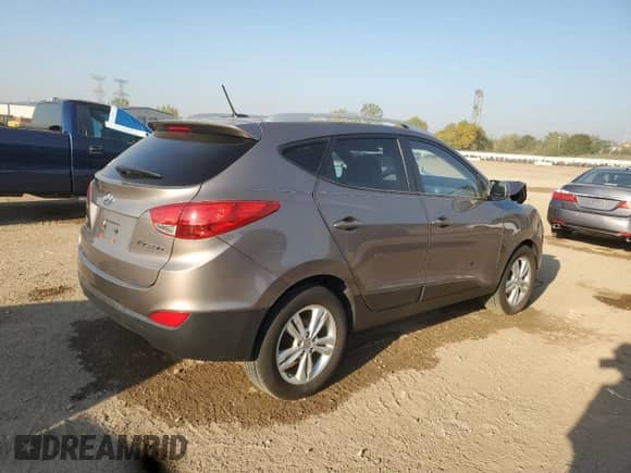 2011 Hyundai Tucson GLS z VIN KM8JU3AC3BU292656, wystawiony jako Copart lot #84770755 z przebiegiem 157 911 mil mil oraz Szkoda całkowita • Salvage title. Historia ofert i sprzedaży dostępna na DreamBid. Obrazek 3.
