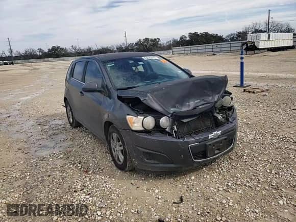 2012 Chevrolet Sonic LT z VIN 1G1JD6SH4C4231312, wystawiony jako Copart lot #43200445 z przebiegiem 94 655 mil mil oraz Szkoda całkowita • Salvage title. Historia ofert i sprzedaży dostępna na DreamBid. Obrazek 11.