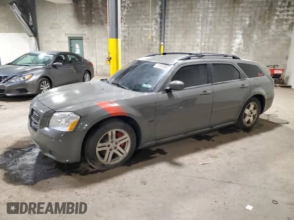 2005 Dodge Magnum RT with VIN 2D8GV58295H164807, listed as a Copart auction lot 71181384 with Not provided miles and Salvage title. Bid and sale history available at DreamBid. Image 1.