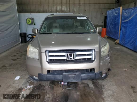 2006 Honda Pilot EX-L z VIN 2HKYF18566H507200, wystawiony jako Copart lot #70293415 z przebiegiem 185 135 mil mil oraz Szkoda całkowita • Salvage title. Historia ofert i sprzedaży dostępna na DreamBid. Obrazek 5.