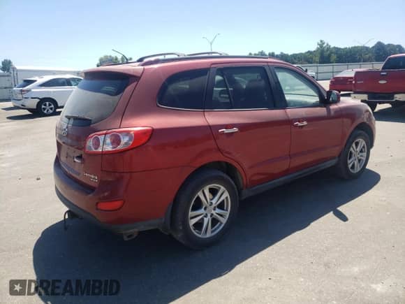 2010 Hyundai Santa Fe Limited with VIN 5NMSK3AB9AH371941, listed as a Copart auction lot 70450995 with 205,649 mi miles and Salvage title. Bid and sale history available at DreamBid. Image 3.