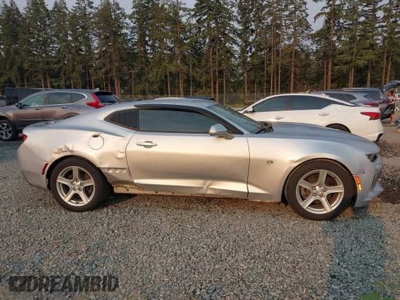 2017 Chevrolet Camaro 1LS z VIN 1G1FA1RXXH0148867, wystawiony jako IAAI lot #43126755 z przebiegiem 66 063 mil mil oraz . Historia ofert i sprzedaży dostępna na DreamBid. Obrazek 14.