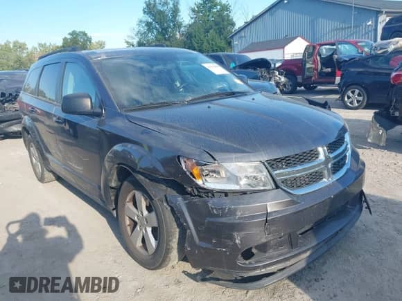 2014 Dodge Journey SE with VIN 3C4PDDAG5ET279249, listed as a IAAI auction lot 43113809 with 205,829 mi miles and . Bid and sale history available at DreamBid. Image 1.