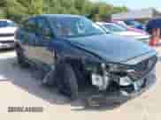 2025 Mazda CX-5 S Carbon Edition z VIN JM3KFBCM7S0587633, wystawiony jako IAAI lot #43335056 z przebiegiem 20 088 mil mil oraz . Historia ofert i sprzedaży dostępna na DreamBid. Obrazek 1.