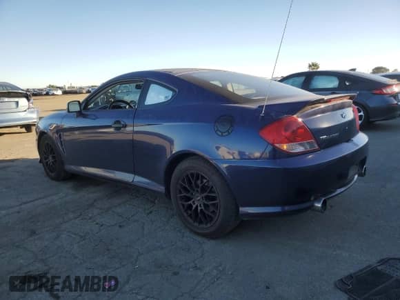 2006 Hyundai Tiburon GS с VIN KMHHM65D06U228731, выставлен на аукционе Copart как лот 87763575 с пробегом 159 487 миль миль и Списание • Salvage title. История ставок и продаж доступна на DreamBid. Изображение 2.