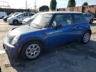 2005 MINI Hardtop with VIN WMWRC33575TJ70740, listed as a Copart auction lot 80576385 with 252,831 mi miles and Salvage title. Bid and sale history available at DreamBid. Image 1.