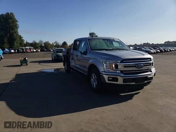 2020 Ford F-150 XL with VIN 1FTFW1E54LFB22154, listed as a Copart auction lot 80659555 with 30,021 mi miles and Salvage title. Bid and sale history available at DreamBid. Image 13.