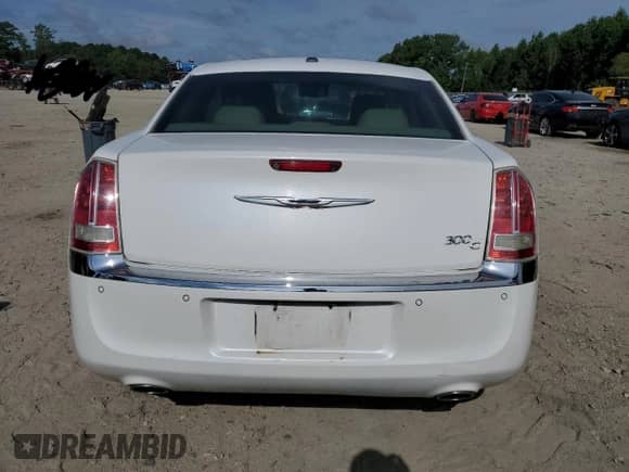 2014 Chrysler 300 C z VIN 2C3CCAEG9EH249114, wystawiony jako Copart lot #67710495 z przebiegiem 155 869 mil mil oraz Szkoda całkowita • Salvage title. Historia ofert i sprzedaży dostępna na DreamBid. Obrazek 6.