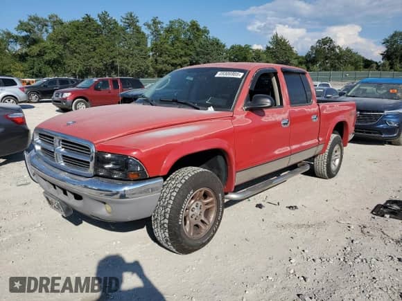 2003 Dodge Dakota SLT с VIN 1D7HG48NX3S122448, выставлен на аукционе Copart как лот 69306905 с пробегом 201 755 миль миль и Списание • Salvage title. История ставок и продаж доступна на DreamBid. Изображение 1.