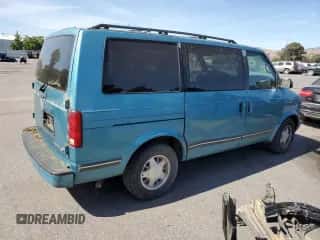 1996 Chevrolet Astro z VIN 1GNDM19W6TB126141, wystawiony jako Copart lot #54097374 z przebiegiem 151 038 mil mil oraz Nie do naprawy • Non repairable. Historia ofert i sprzedaży dostępna na DreamBid. Obrazek 3.