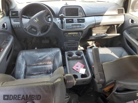 2006 Honda Odyssey Touring with VIN 5FNRL38806B058341, listed as a Copart auction lot 85156945 with 179,897 mi miles and Salvage title. Bid and sale history available at DreamBid. Image 8.