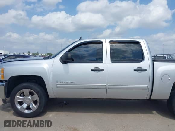 2013 Chevrolet Silverado 1500 LS z VIN 3GCPCREAXDG285125, wystawiony jako IAAI lot #42167476 z przebiegiem 201 813 mil mil oraz . Historia ofert i sprzedaży dostępna na DreamBid. Obrazek 14.