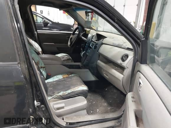 2011 Honda Pilot EX with VIN 5FNYF4H46BB014571, listed as a IAAI auction lot 43572141 with 243,613 mi miles and . Bid and sale history available at DreamBid. Image 5.