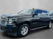 2019 Chevrolet Suburban LS with VIN 1GNSCGKC4KR325580, listed as a Copart auction lot 90409115 with 203,810 mi miles and Clean title. Bid and sale history available at DreamBid. Image 2.