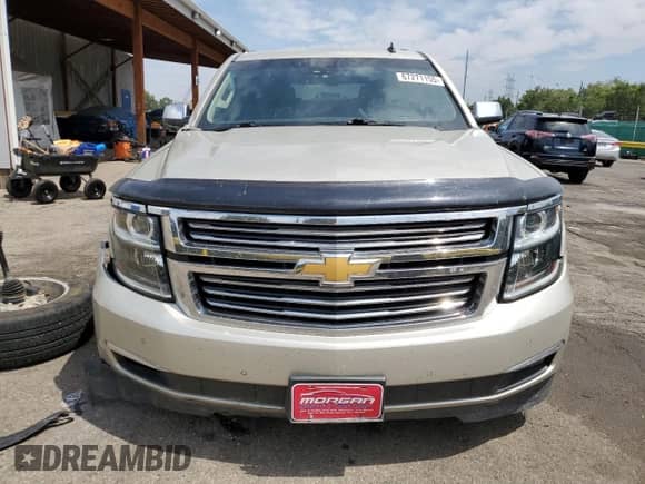 2015 Chevrolet Tahoe LTZ с VIN 1GNSKCKC9FR111797, выставлен на аукционе Copart как лот 67271155 с пробегом 183 695 миль миль и Списание • Salvage title. История ставок и продаж доступна на DreamBid. Изображение 5.