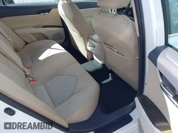 2021 Toyota Camry LE with VIN 4T1C11AK8MU601313, listed as a IAAI auction lot 43383218 with 34,384 mi miles and . Bid and sale history available at DreamBid. Image 8.