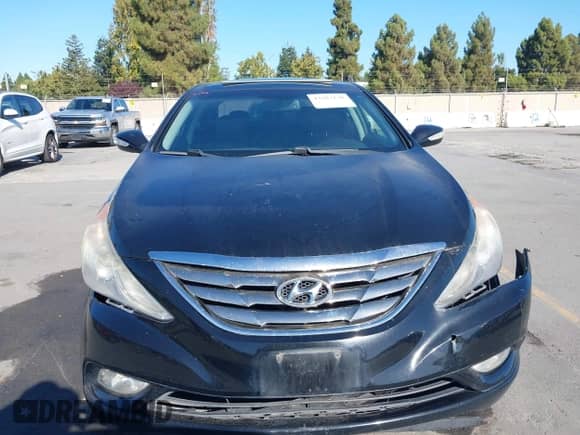 2013 Hyundai Sonata SE with VIN 5NPEC4AC2DH670705, listed as a IAAI auction lot 43283130 with 151,485 mi miles and . Bid and sale history available at DreamBid. Image 6.