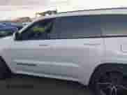 2018 Jeep Grand Cherokee Overland with VIN 1C4RJFCG7JC158464, listed as a IAAI auction lot 42056386 with 94,608 mi miles and . Bid and sale history available at DreamBid. Image 15.