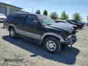 1999 Chevrolet Blazer LT z VIN 1GNDT13W4X2248675, wystawiony jako Copart lot #59103635 z przebiegiem 105 827 mil mil oraz Szkoda całkowita • Salvage title. Historia ofert i sprzedaży dostępna na DreamBid. Obrazek 4.