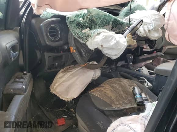 2016 Toyota Tacoma SR z VIN 5TFCZ5AN5GX030400, wystawiony jako Copart lot #65200005 z przebiegiem Nie podano mil oraz Czysty tytuł • Clean title. Historia ofert i sprzedaży dostępna na DreamBid. Obrazek 8.