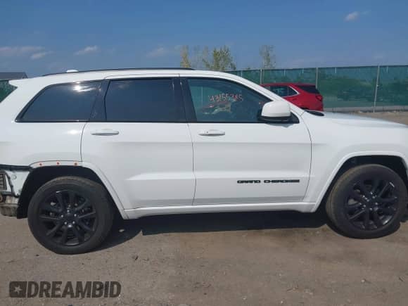 2020 Jeep Grand Cherokee Altitude with VIN 1C4RJFAG5LC126201, listed as a IAAI auction lot 43155385 with 75,215 mi miles and . Bid and sale history available at DreamBid. Image 14.