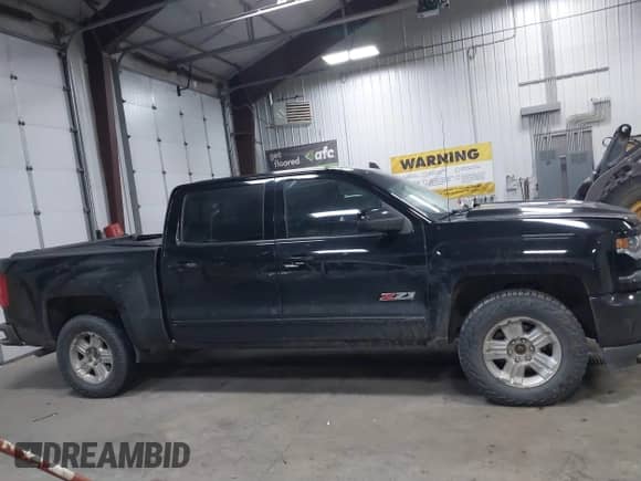 2017 Chevrolet Silverado 1500 LTZ z VIN 3GCUKSEJ3HG382718, wystawiony jako IAAI lot #41426789 z przebiegiem 145 620 mil mil oraz . Historia ofert i sprzedaży dostępna na DreamBid. Obrazek 13.