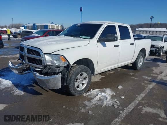 2017 Ram 1500 Tradesman z VIN 1C6RR7KG1HS809675, wystawiony jako IAAI lot #41242900 z przebiegiem 210 254 mil mil oraz . Historia ofert i sprzedaży dostępna na DreamBid. Obrazek 2.