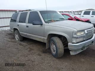 1999 Chevrolet Tahoe z VIN 1GNEK13R0XJ345167, wystawiony jako IAAI lot #43425775 z przebiegiem 227 975 mil mil oraz . Historia ofert i sprzedaży dostępna na DreamBid. Obrazek 1.