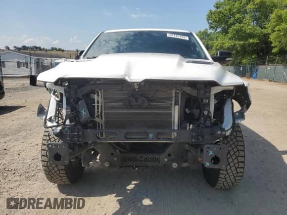 2021 Ram 1500 Rebel z VIN 1C6SRFLT4MN568663, wystawiony jako Copart lot #62730705 z przebiegiem 98 938 mil mil oraz Szkoda całkowita • Salvage title. Historia ofert i sprzedaży dostępna na DreamBid. Obrazek 5.