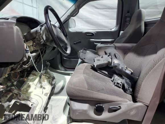 2000 Ford F-150 XL с VIN 1FTPF18L2YNA25370, выставлен на аукционе Copart как лот 69598605 с пробегом Не указан миль и Списание • Salvage title. История ставок и продаж доступна на DreamBid. Изображение 7.