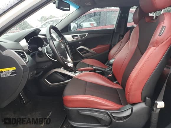 2013 Hyundai Veloster w/Black Int с VIN KMHTC6AD0DU149690, выставлен на аукционе Copart как лот 68201775 с пробегом 112 030 миль миль и Списание • Salvage title. История ставок и продаж доступна на DreamBid. Изображение 7.