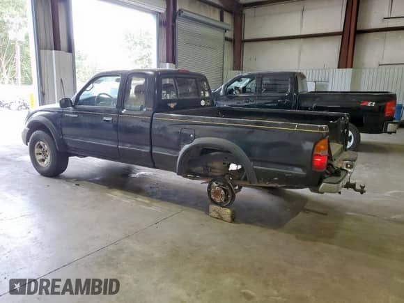 1998 Toyota Tacoma z VIN 4TAWN72N8WZ077681, wystawiony jako Copart lot #84891125 z przebiegiem 154 484 mil mil oraz Czysty tytuł • Clean title. Historia ofert i sprzedaży dostępna na DreamBid. Obrazek 2.